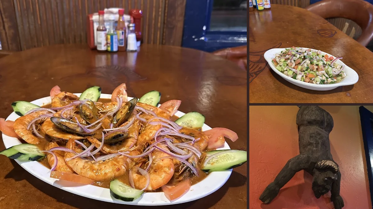 Seafood plates on a busy restaurant table.