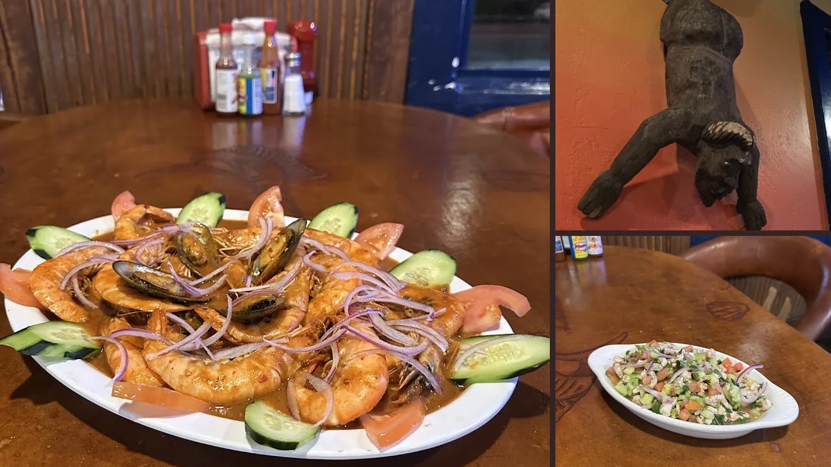 Seafood plates on a busy restaurant table.