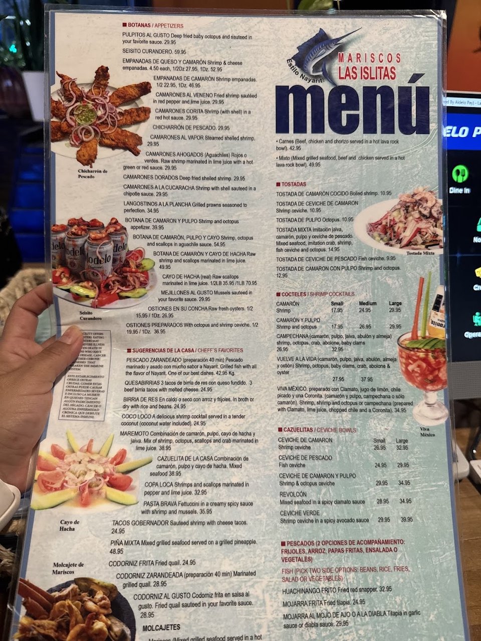Restaurant menu listing seafood plates and appetizers.